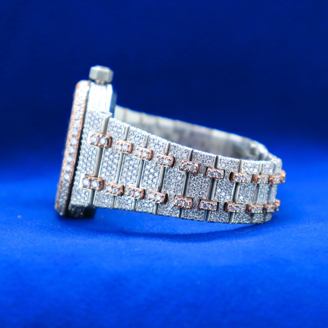 Left side angle of 14k Moissanite Roman Frost Phantom Royale half iced out custom watch with silver and moissanite diamonds