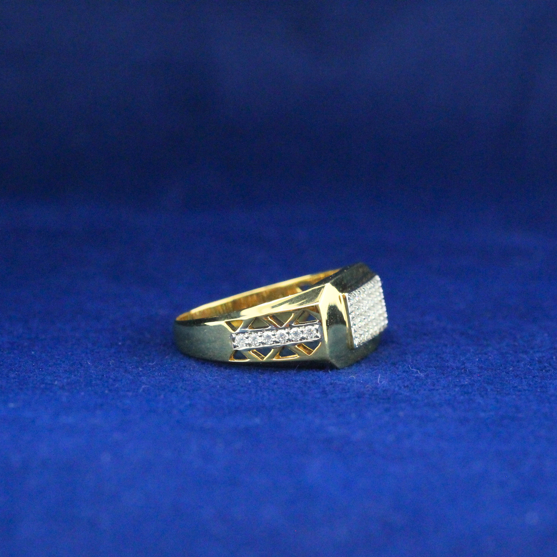 Right angle view of silver baguette ring with moissanite diamonds, sparkling fine jewelry piece.