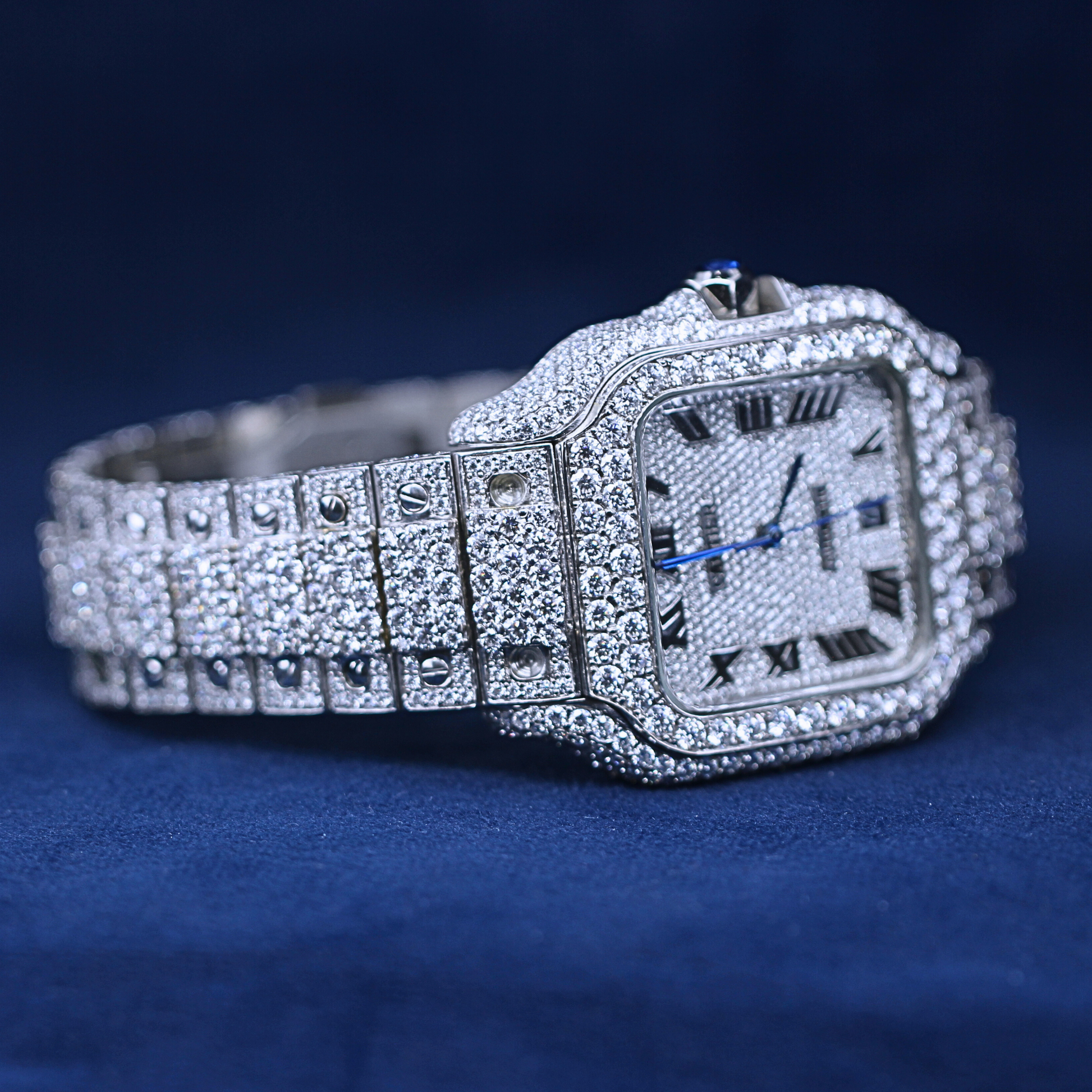 A left-side view of a custom iced-out hip-hop watch in 925 sterling silver, featuring an iced-out band with brilliant Moissanite diamonds for maximum shine.