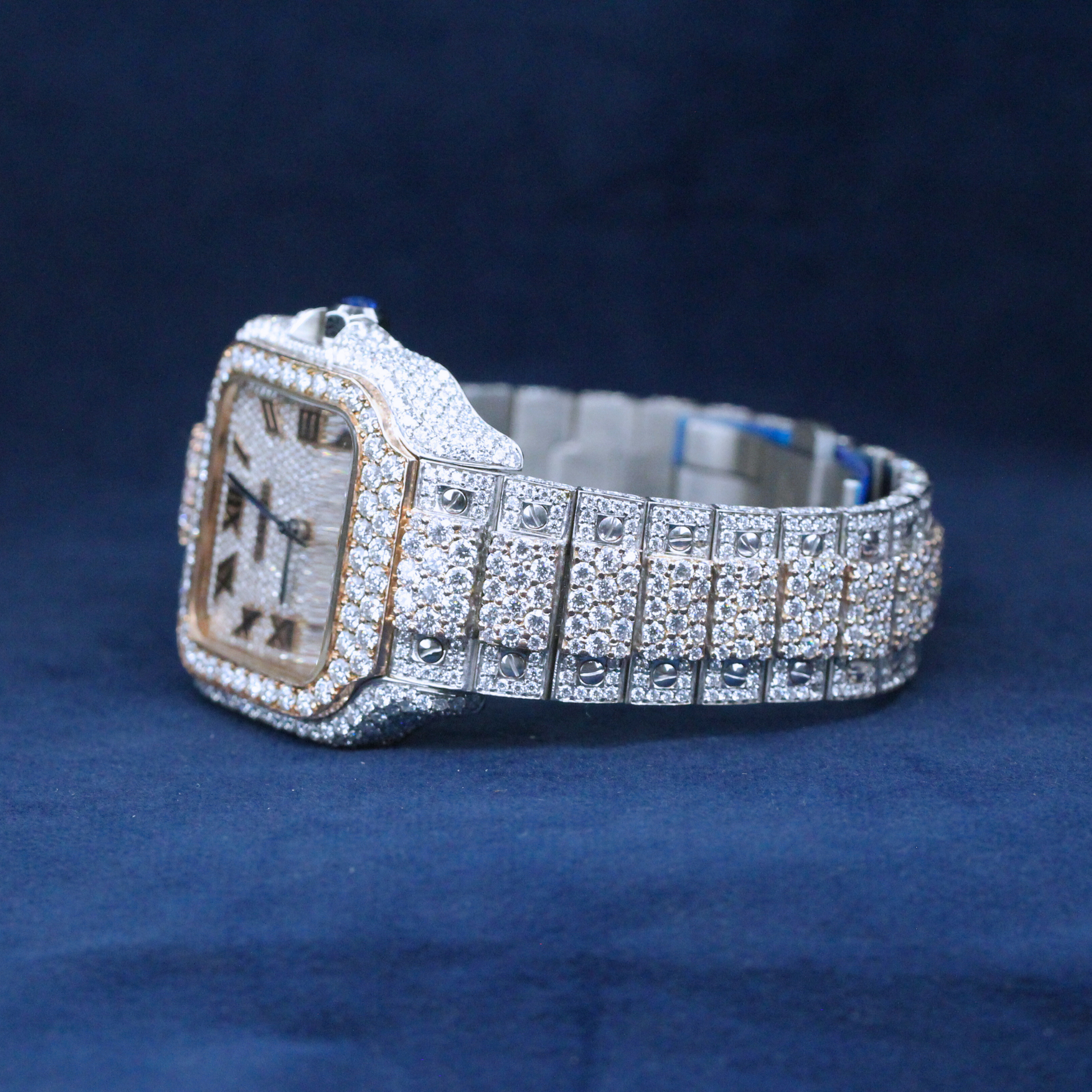 A right-side view of a custom iced-out hip-hop watch featuring a square design with a fully iced-out bezel and Moissanite diamond-studded bracelet.