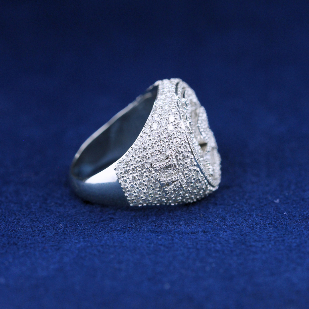 A left-side view of a fine jewelry championship ring in 925 sterling silver, showcasing the intricate craftsmanship and premium-quality moissanite diamonds