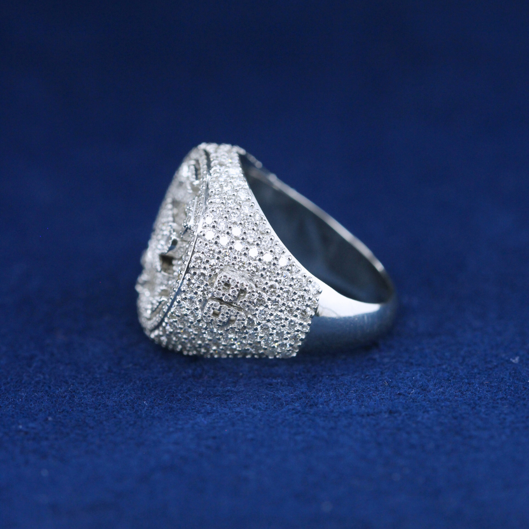 A right-side view of a fine jewelry championship ring in 925 sterling silver, highlighting the detailed engravings and sparkling moissanite diamond accents.