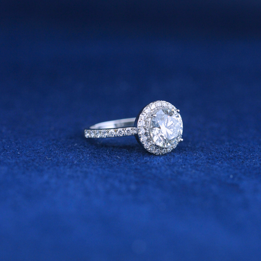 A left-side view of a fine jewelry solitaire diamond ring in 925 sterling silver, designed with a minimalist yet luxurious appeal.