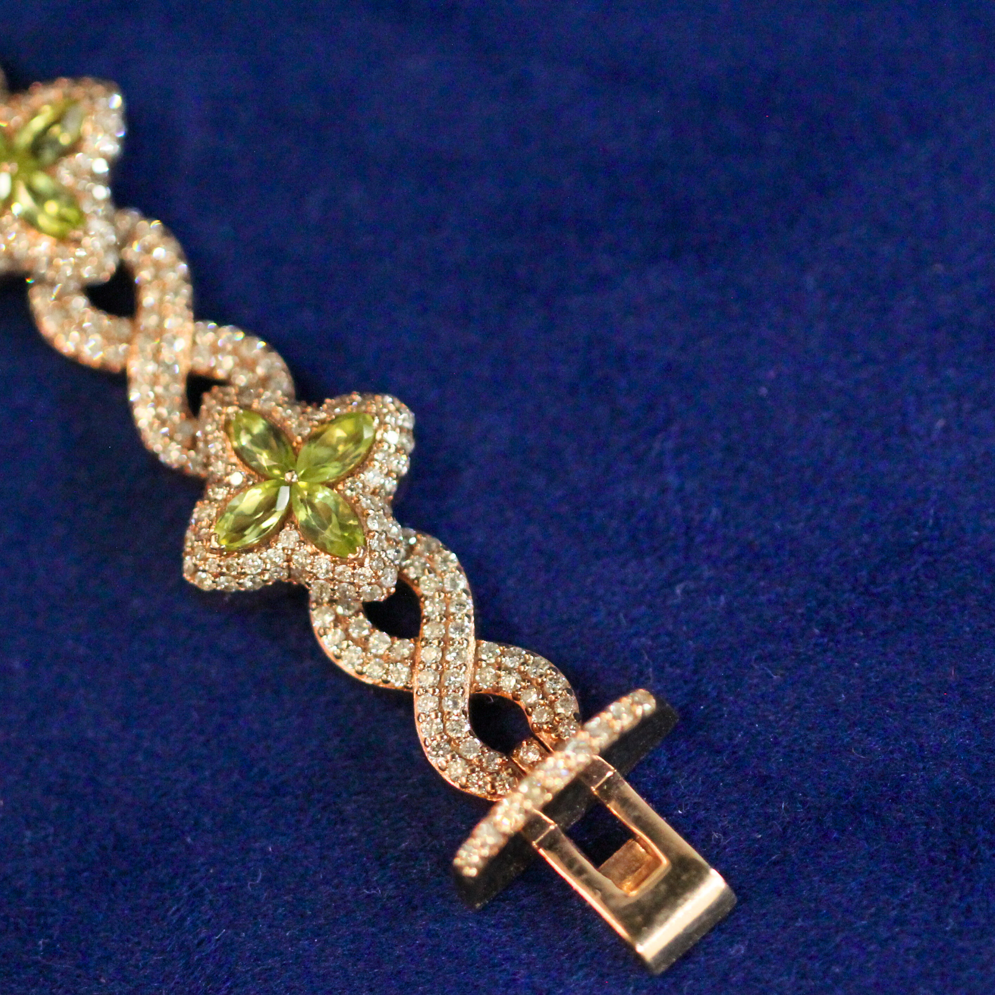 Detailed lock strap view of the floral colored bracelet showing secure clasp mechanism in 925 silver with moissanite gemstones, fine jewelry.