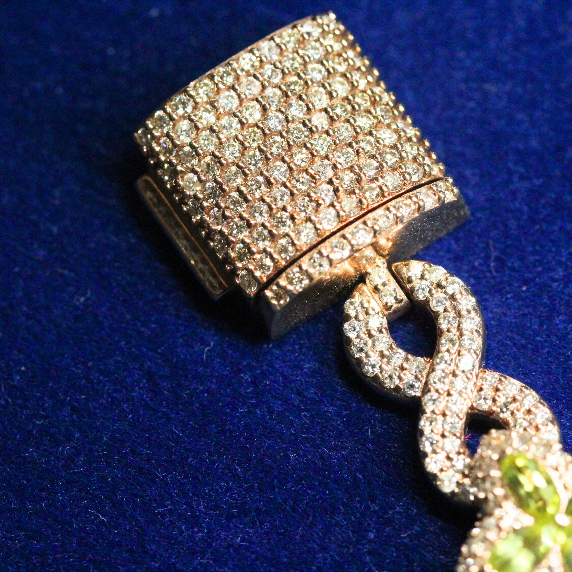 Close-up zoom view of the lock clasp on the floral colored bracelet in 925 silver with moissanite, showcasing secure fastening detail, fine jewelry.