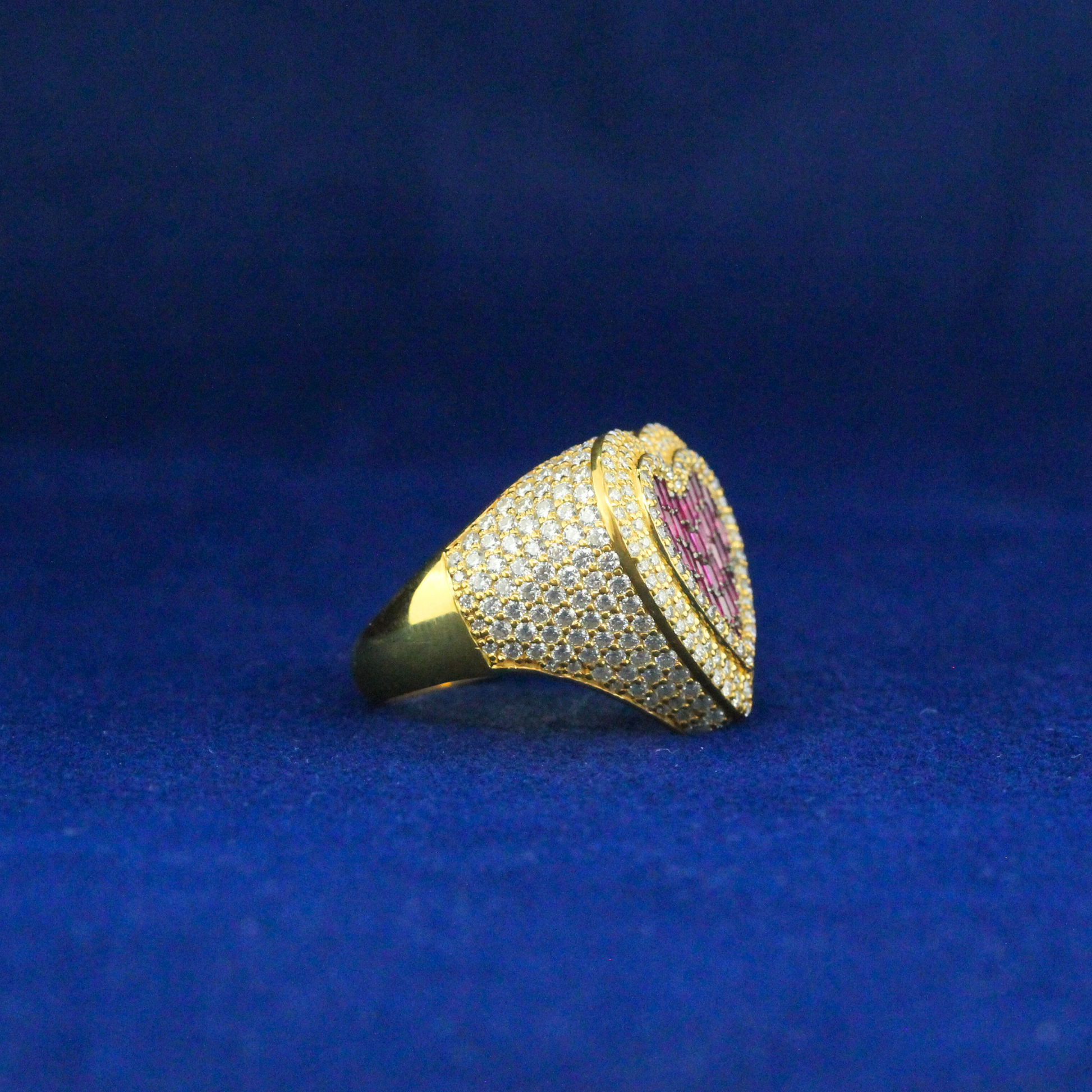 Left angle of heart ring in gold with icy moissanite diamond, luxury hip hop jewelry with flair.