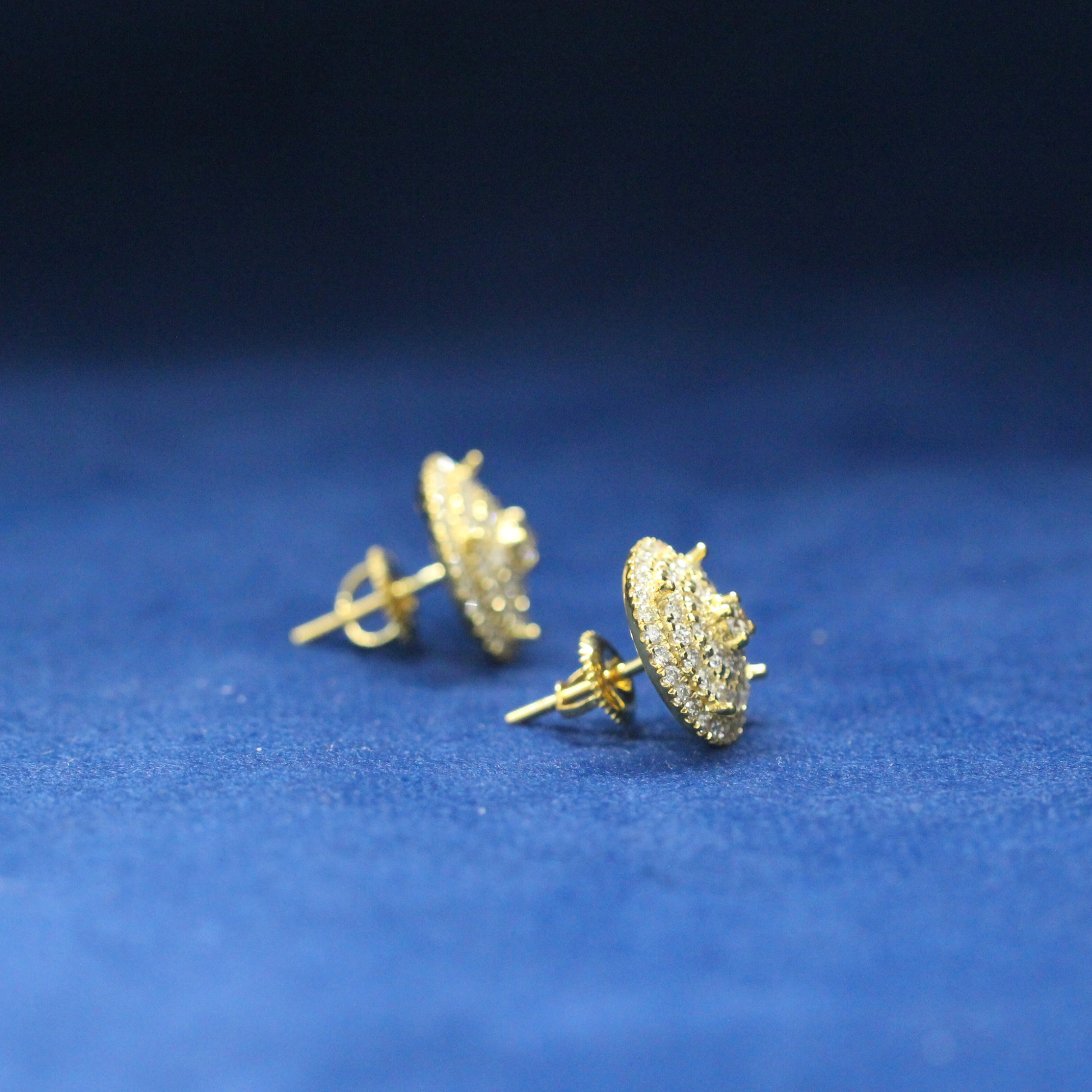 Left-side view of Galaxy Spark Studs earrings in 925 silver, showcasing a celestial-inspired style with fully iced Moissanite diamonds for hip-hop fashion lovers.