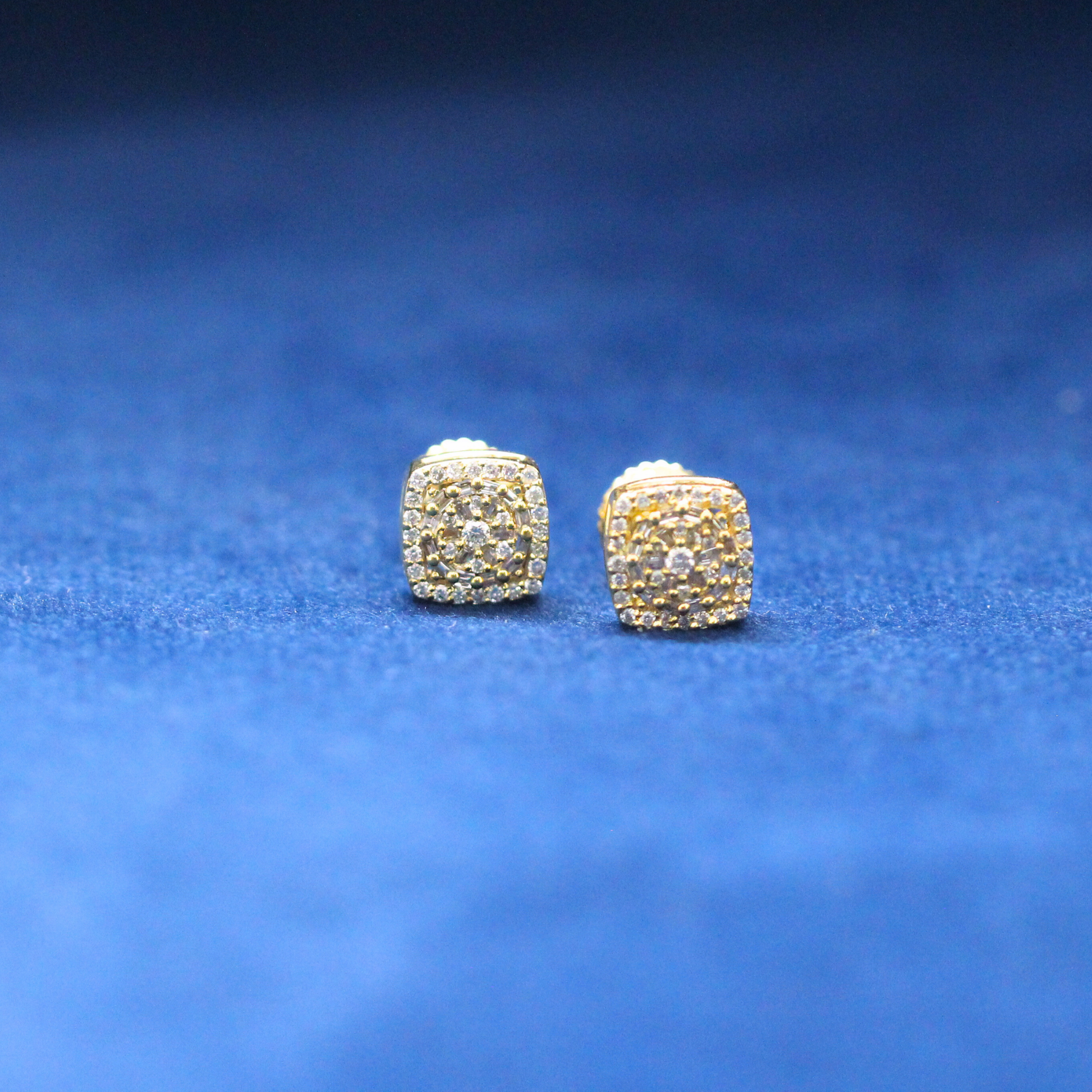 Golden Frost Studs earrings in 925 silver, iced out with Moissanite diamonds for a bold and stylish hip-hop jewelry statement.