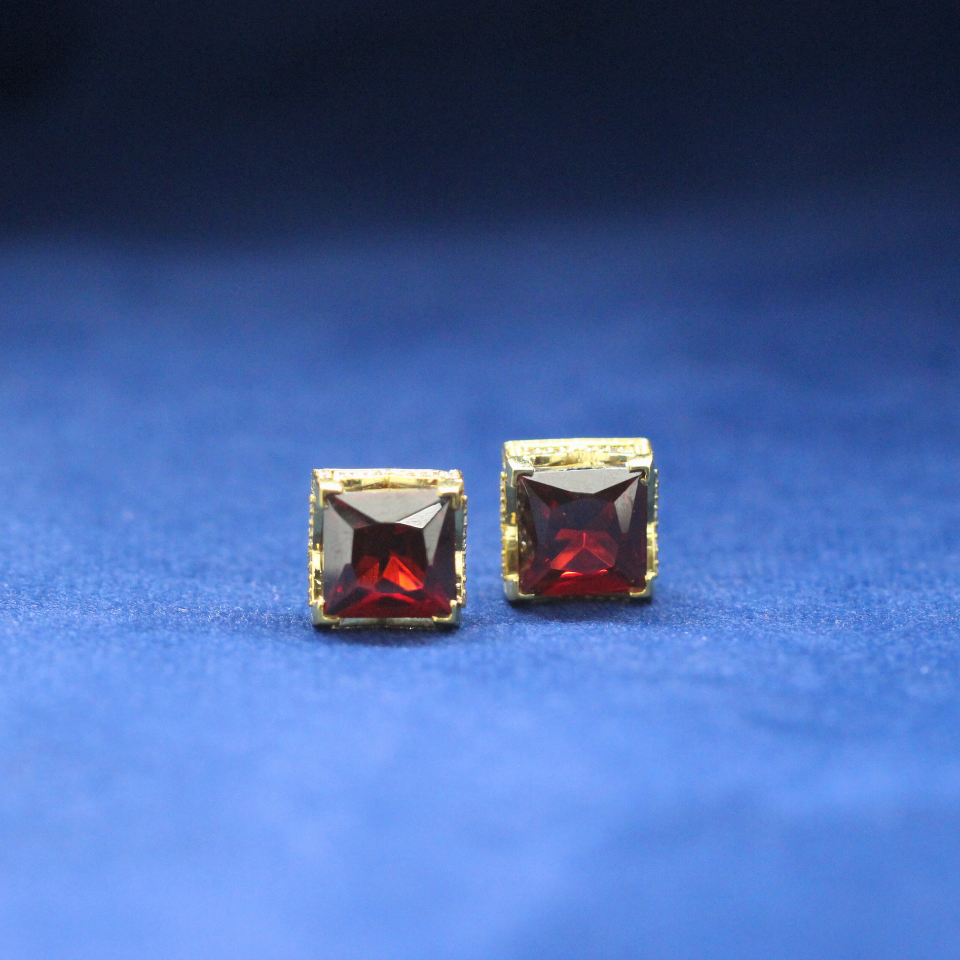 Ruby Cube Studs earrings in 925 silver, featuring a bold cube design with vibrant ruby stones and Moissanite diamonds for a luxury hip-hop jewelry look.