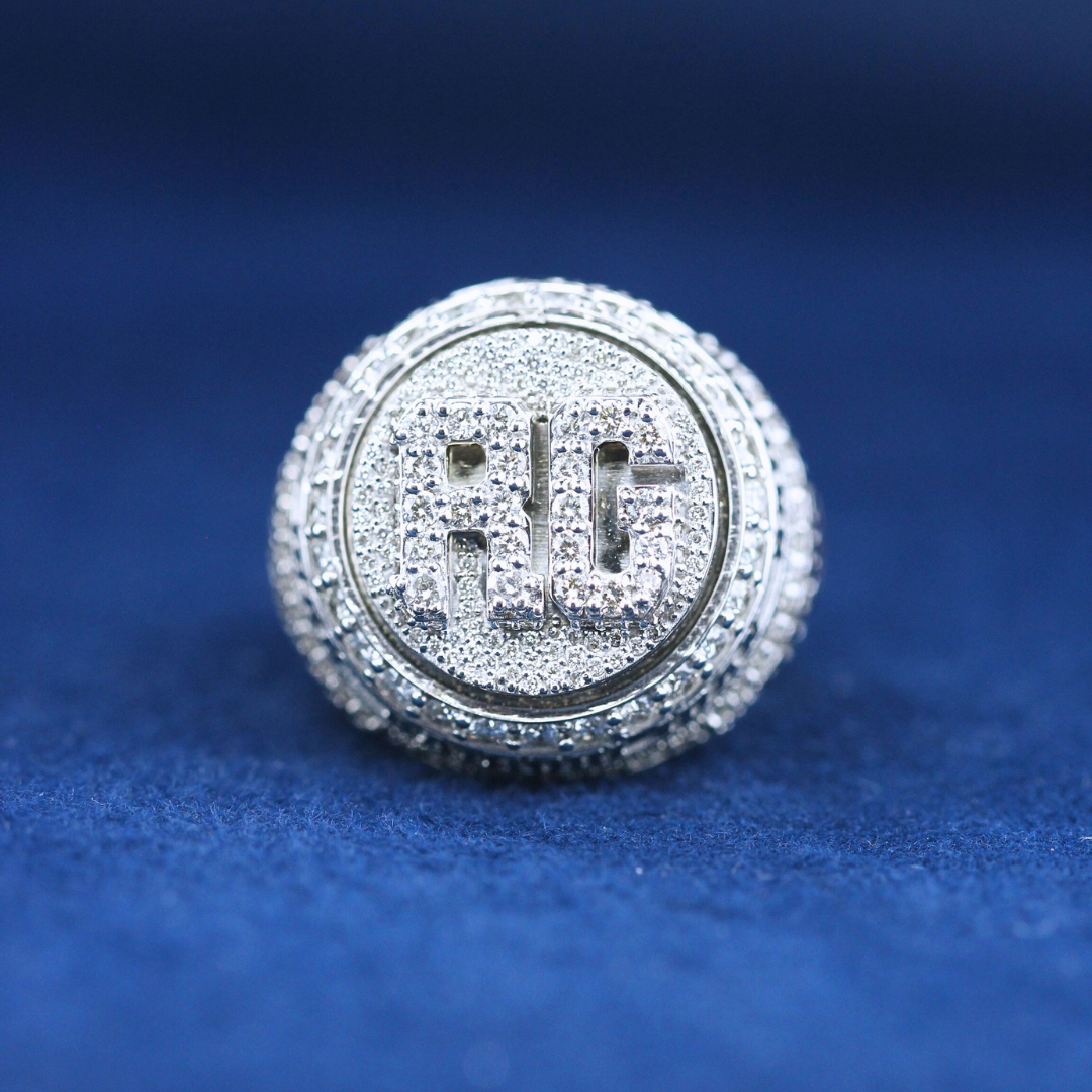 A bold hip-hop jewelry RC Championship ring in 925 sterling silver, featuring intricate detailing and diamond accents for a statement look.