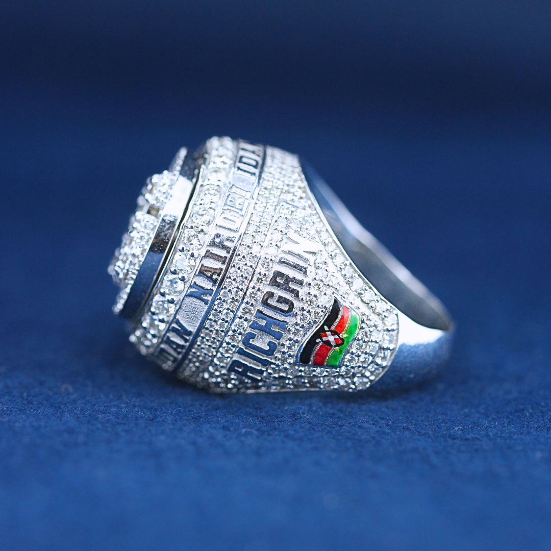 A right-side view of a hip-hop jewelry RC Championship ring in 925 sterling silver, showcasing luxury craftsmanship and engraved details."