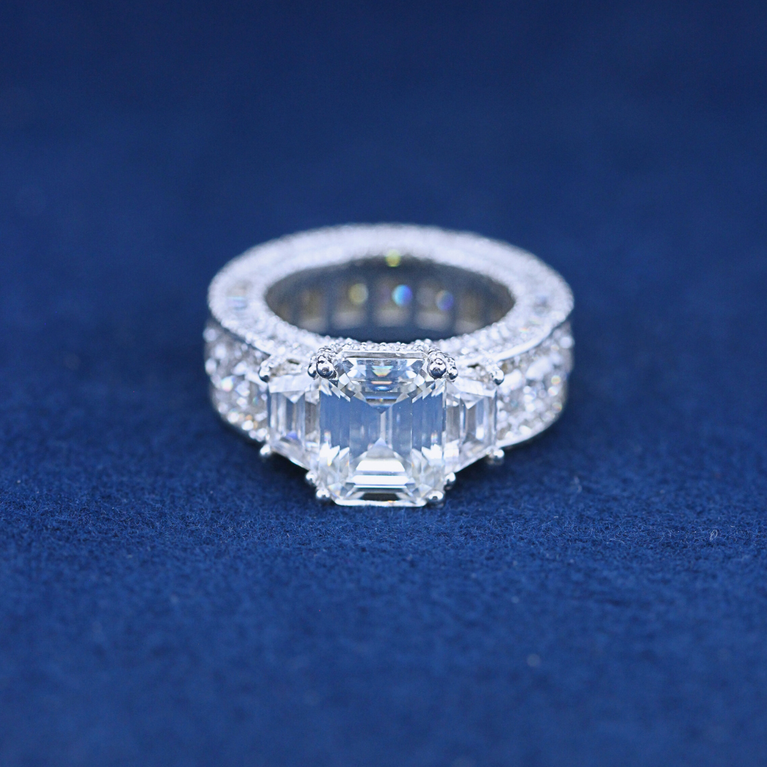"A bold hip-hop jewelry total iced-out ring in 925 sterling silver, fully encrusted with dazzling diamonds for a statement-making look."
