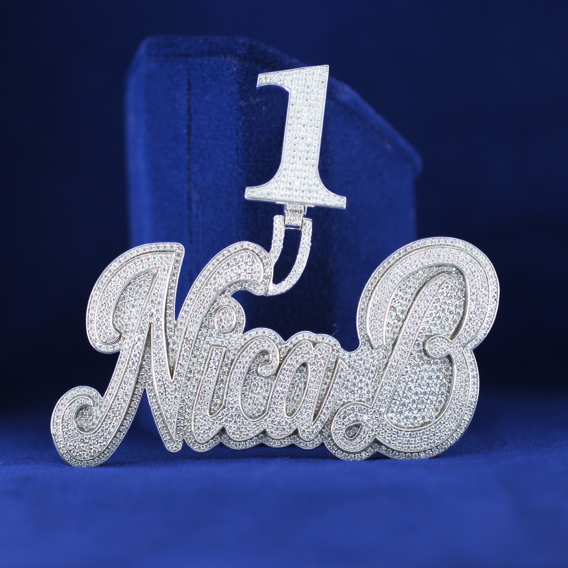 Top view of Number 1 Nica B Diamond Pendant, highlighting the moissanite diamond-encrusted surface and luxury hip-hop design.