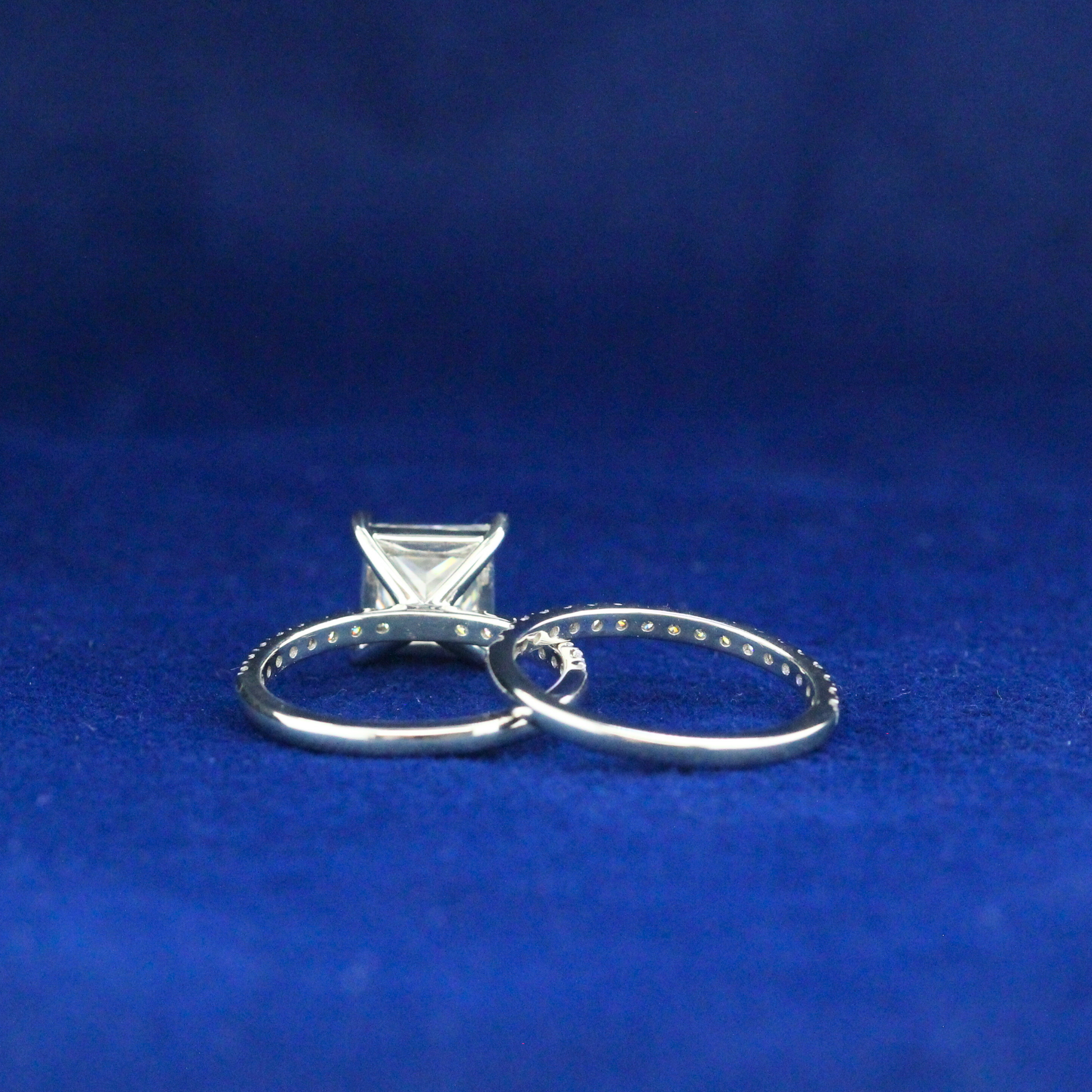 Back view of detailed princess ring with moissanite diamond, crafted in 925 silver, perfect fine jewelry.