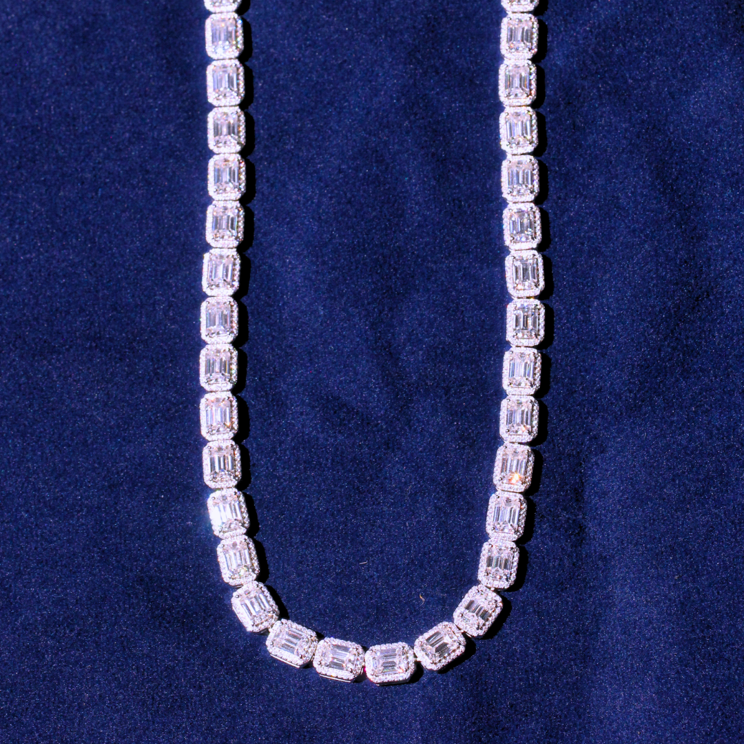 Right angle shot of a baguette chain featuring sparkling moissanite diamonds set in 925 silver, designed for luxury hip hop style.