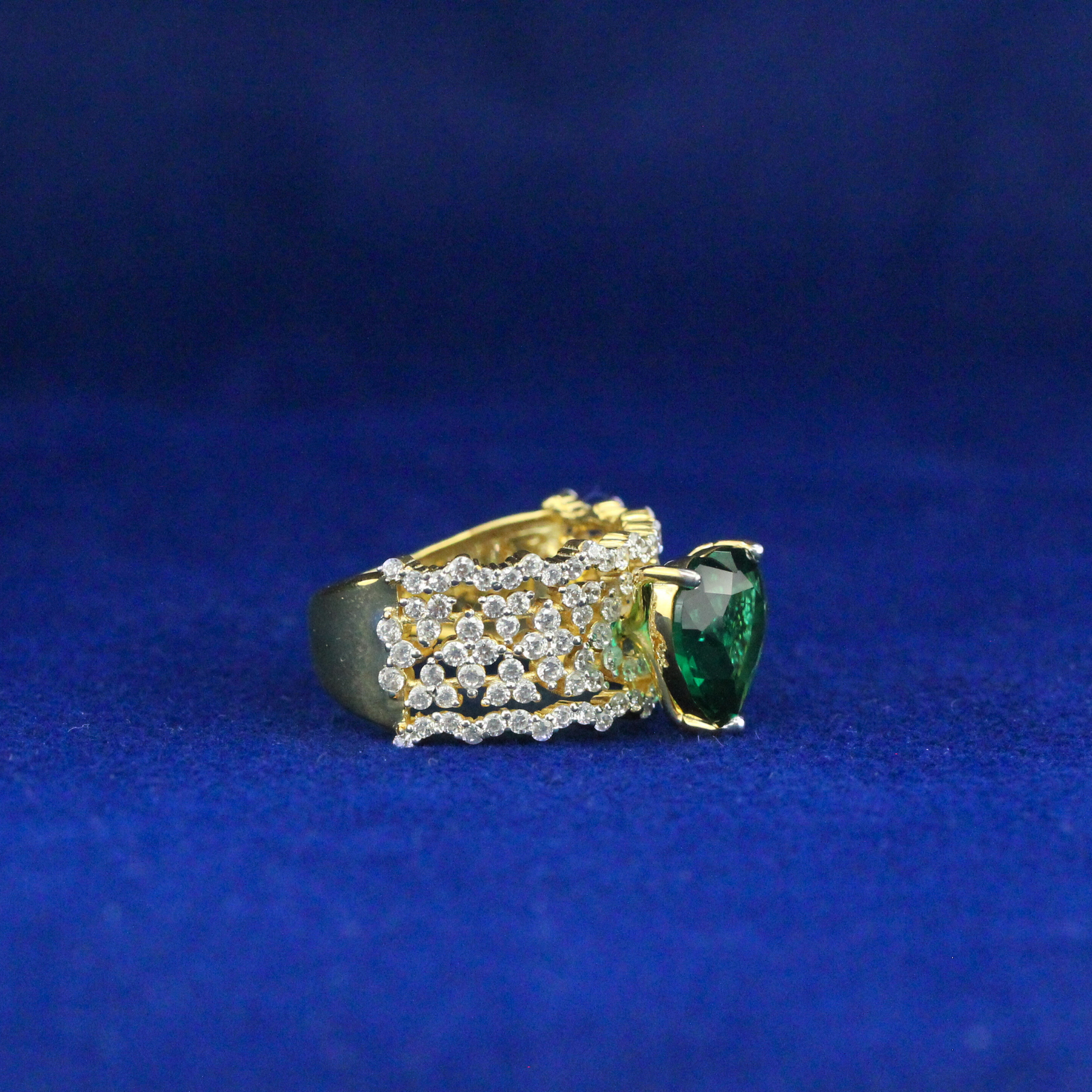Right side view of heart design ring with moissanite and Zarkan detail in 925 silver, luxury fine jewelry.