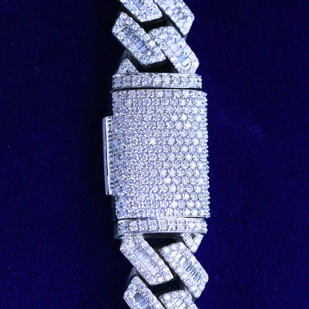Close-up view of the custom iced-out lock on a Cuban link chain, crafted in 925 silver and moissanite diamonds, showcasing detailed craftsmanship and secure fit in fine hip hop jewelry.