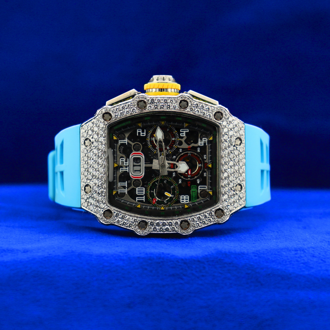 Front view of Aqua Blue Phantom in 14K white gold with moissanite diamonds – half iced out custom watch for men and women with icy aqua face