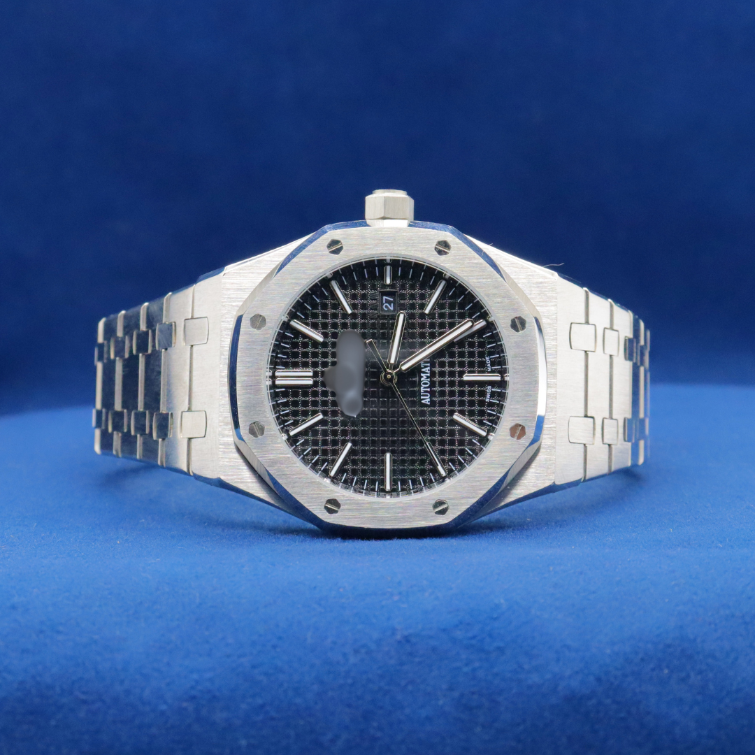 Front view of Arctic Steel Timepiece plain stainless steel watch with a bold and modern design.