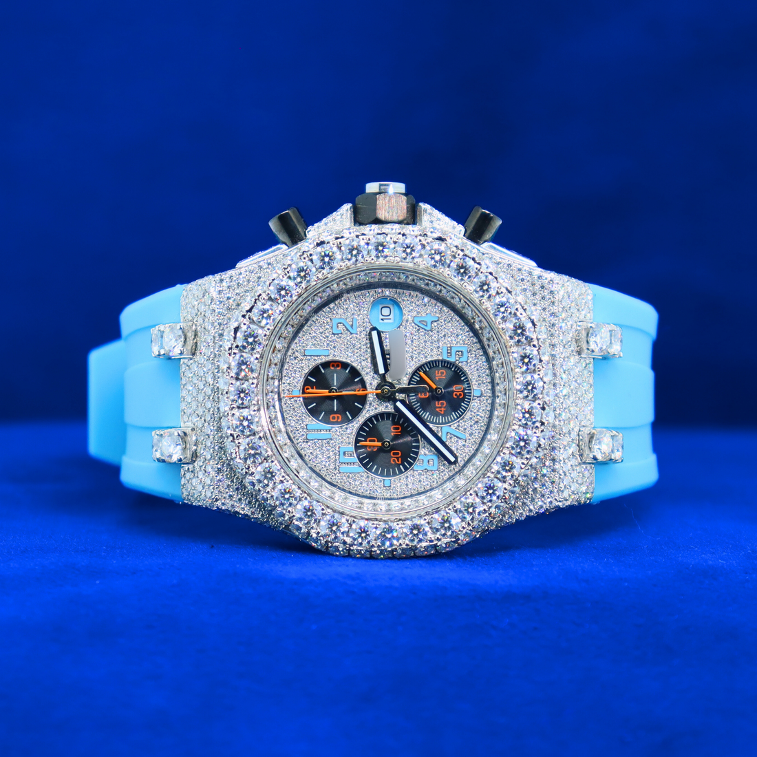 Front view of Blue Iced Frost Phantom in 14K white gold and moissanite diamonds – half iced out custom hip hop watch with icy blue details