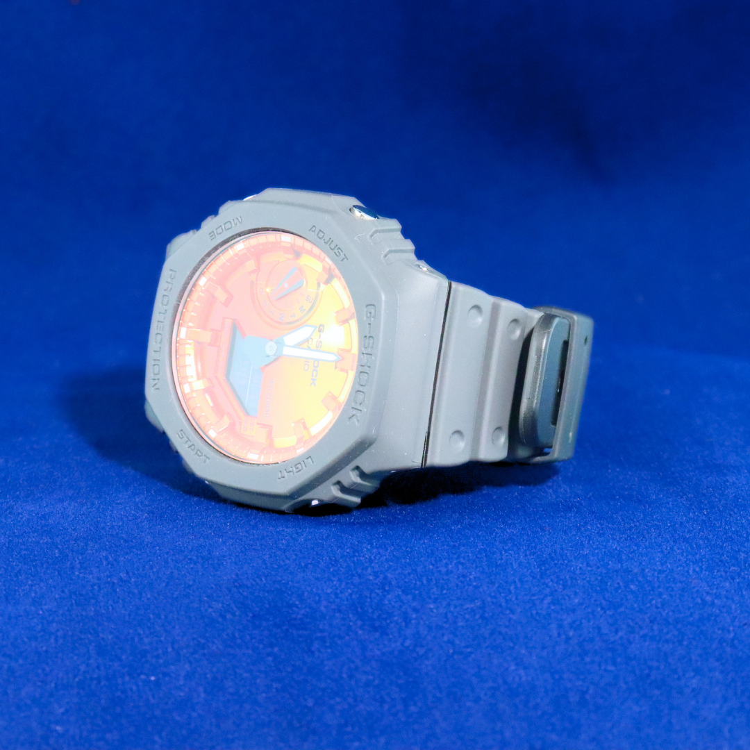Left side view of G-Shock Limited Edition Orange Burst Watch – Vibrant orange timepiece with durable construction