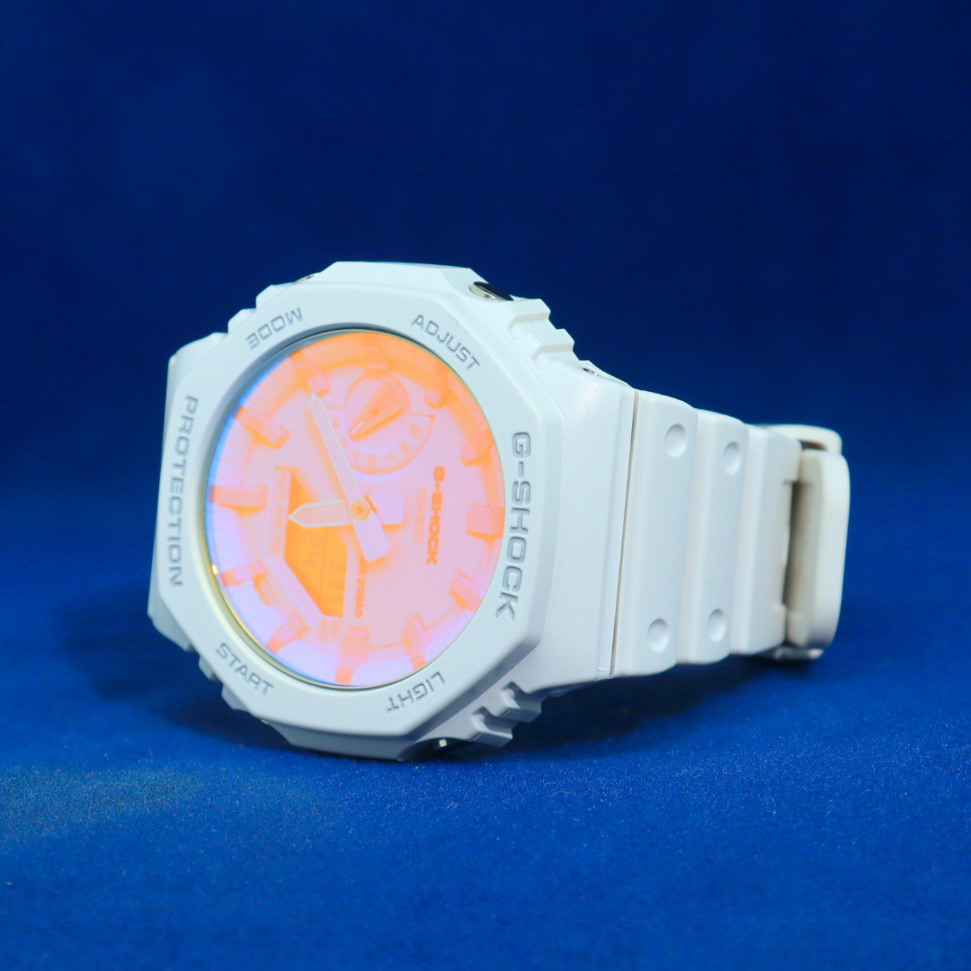 Left side view of G-Shock White Resin Watch with Aqua Dial – Lightweight and modern timepiece