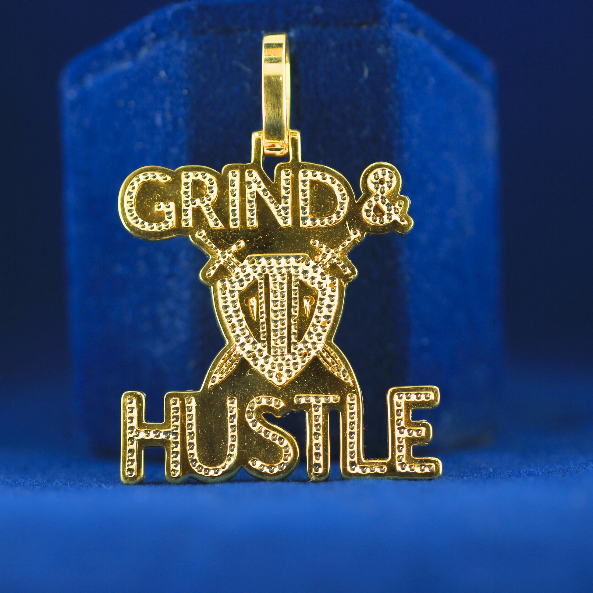 Front view of GRIND & HUSTLE pendant in 925 silver with MOISSANITE diamonds, a fine jewelry statement piece.