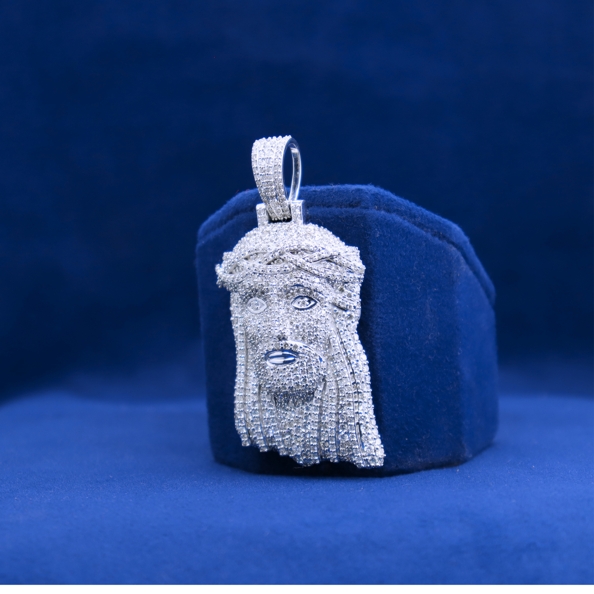 Left side view of 14k silver Iced Out Jesus Piece Pendant featuring diamond moissanite, ideal for half iced out custom watch sets