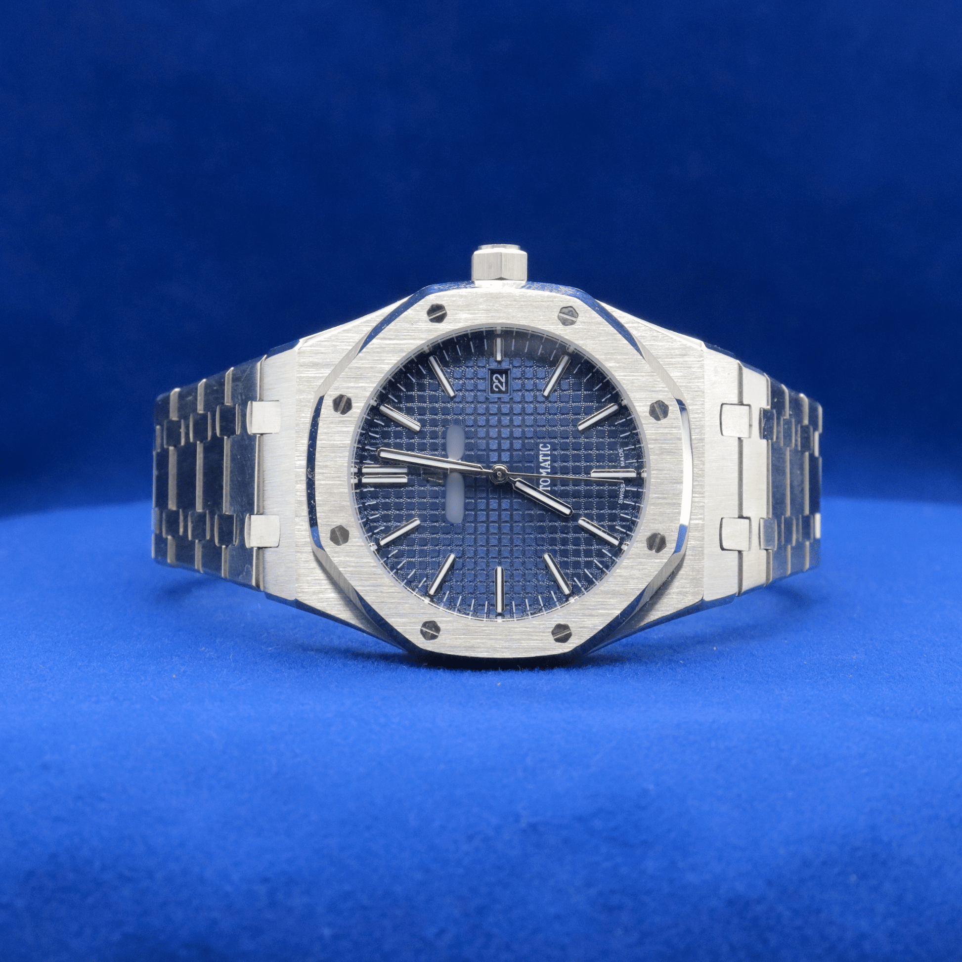 Front view of Luxury Blue Dial Masterpiece plain stainless steel watch with a bold and modern design.