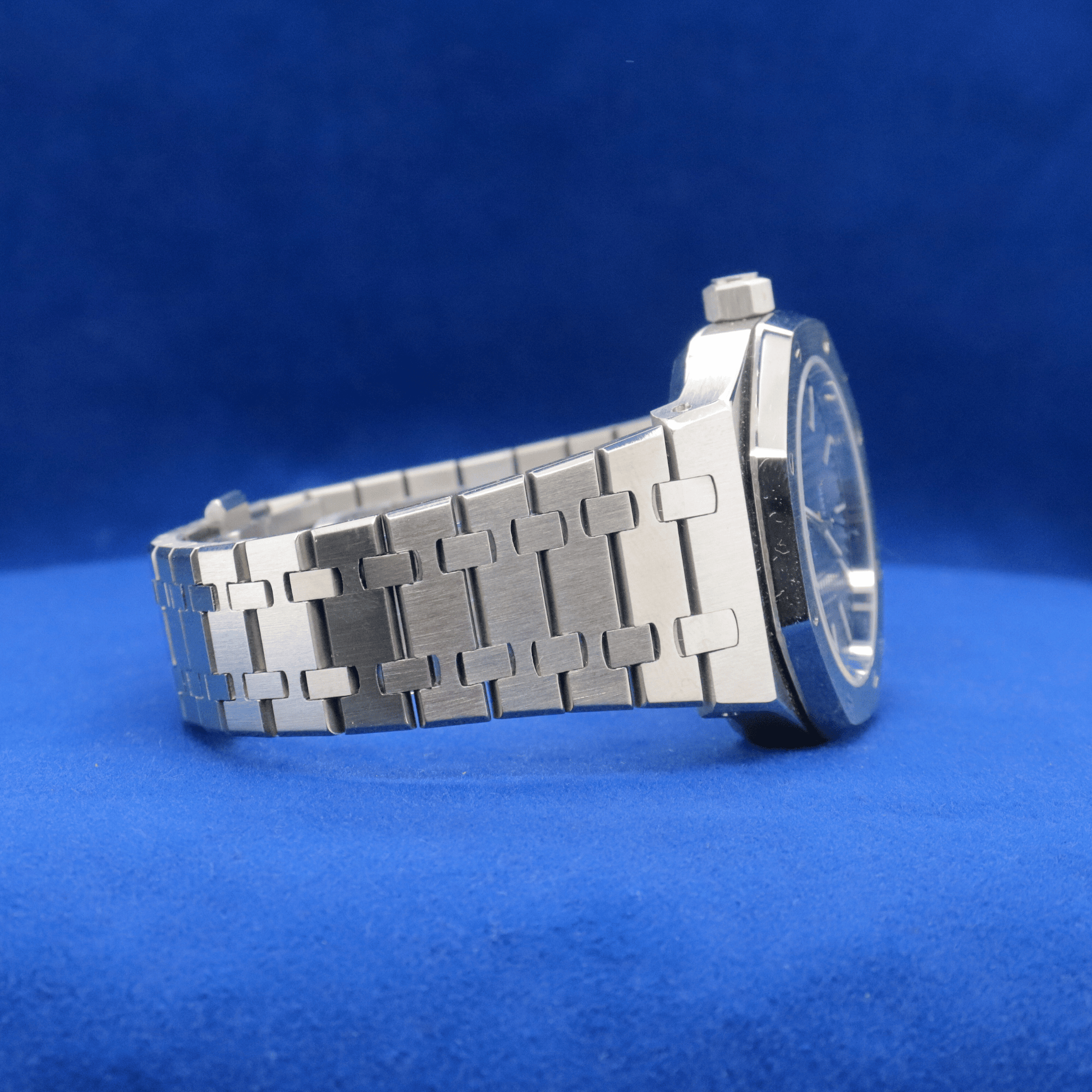 Right-side view of Luxury Blue Dial Masterpiece stainless steel watch, featuring a sleek and timeless look.
