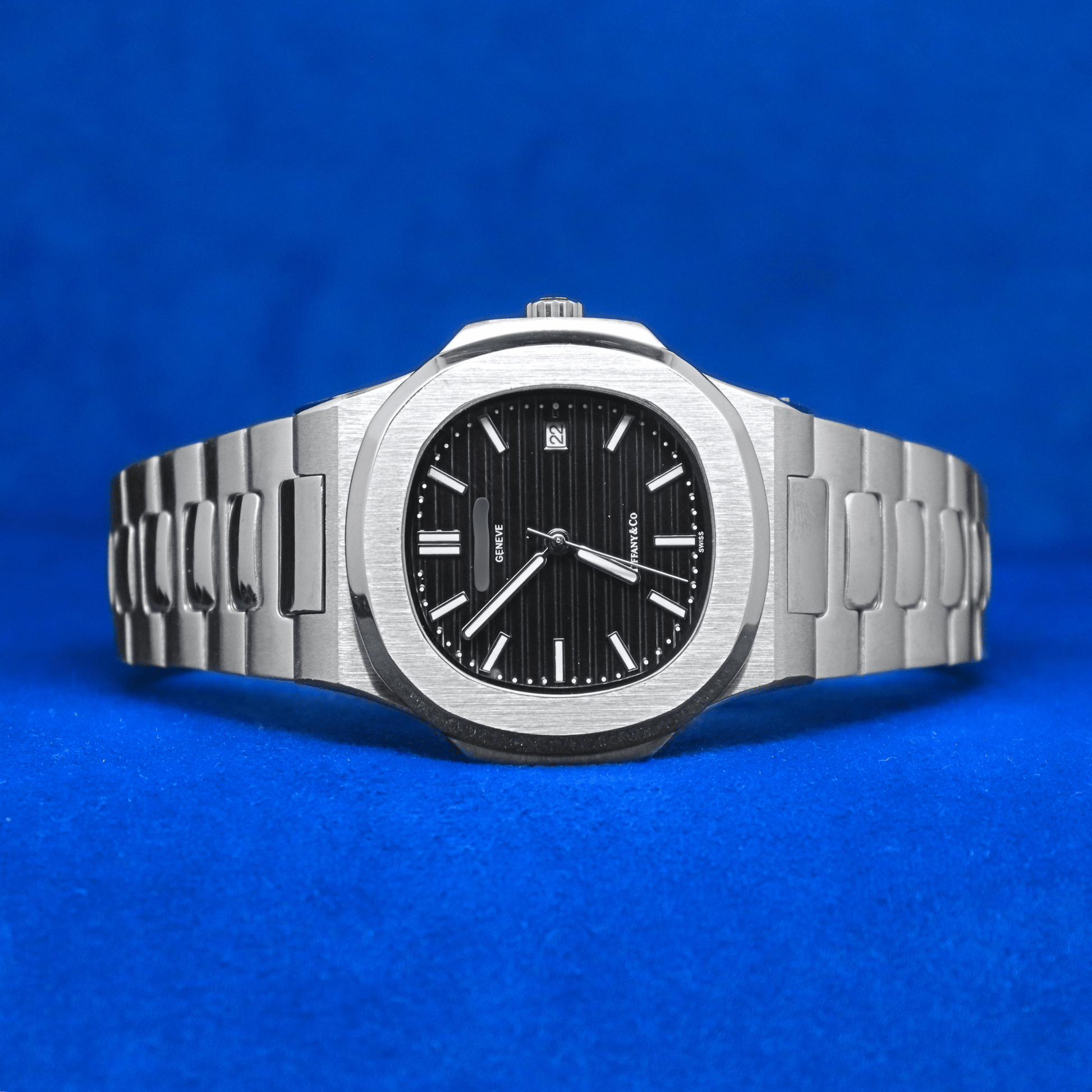 Front view of Nautilus Master Chrono plain stainless steel watch with a bold and modern design.