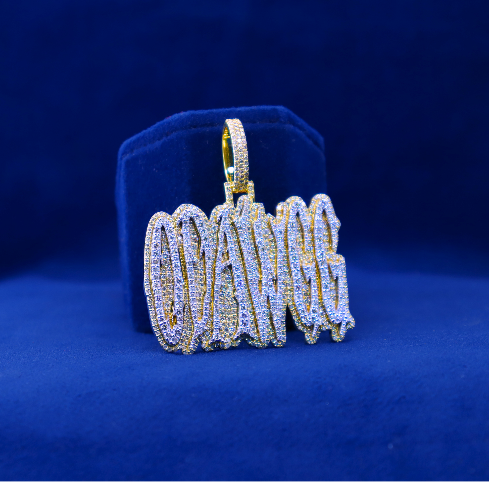 "Right angle of Odawgg custom iced out pendant, 14K silver and moissanite, designed to pair with half iced out custom watches."