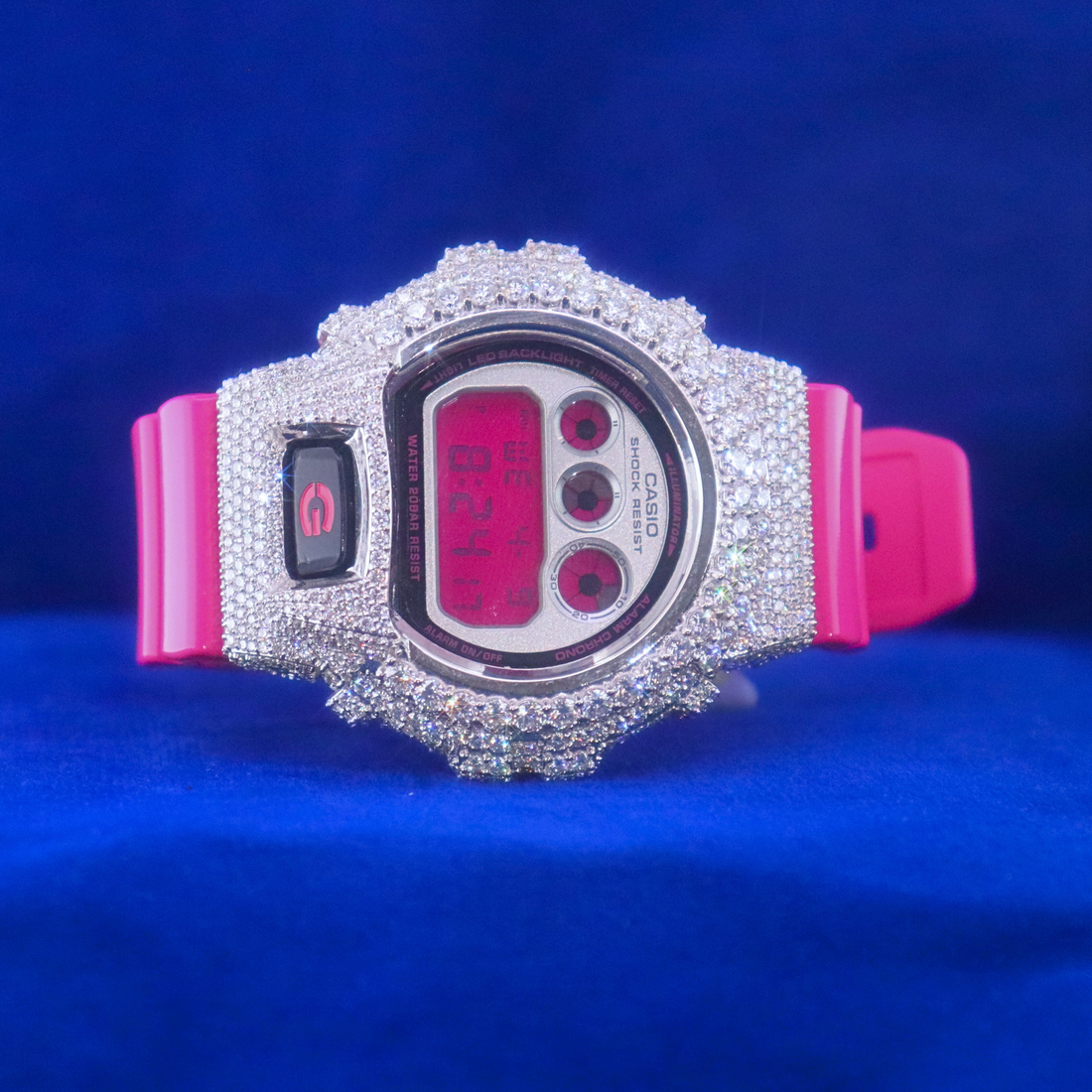 Front view of Pink Frost Phantom Blaze – digital half iced out custom watch with moissanite diamonds and 14K white gold