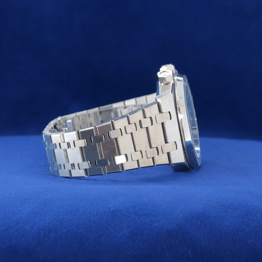 Right-side view of Precision Crafted Steel Sports Watch stainless steel watch, featuring a sleek and timeless look.