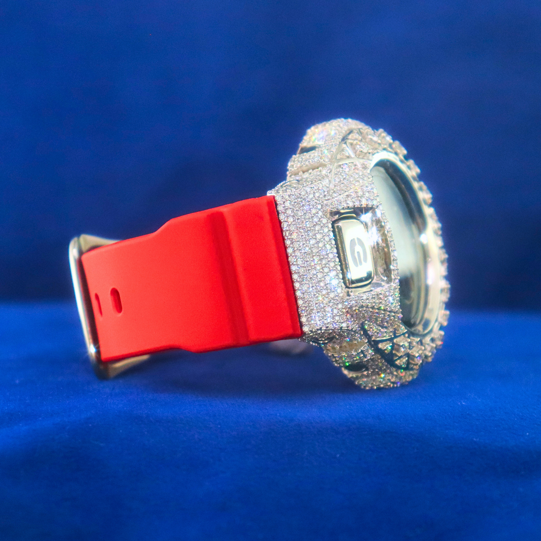 Front view of Red Digital Iced Phantom Blaze in 14K white gold with moissanite diamonds – custom half iced out digital watch with red heat