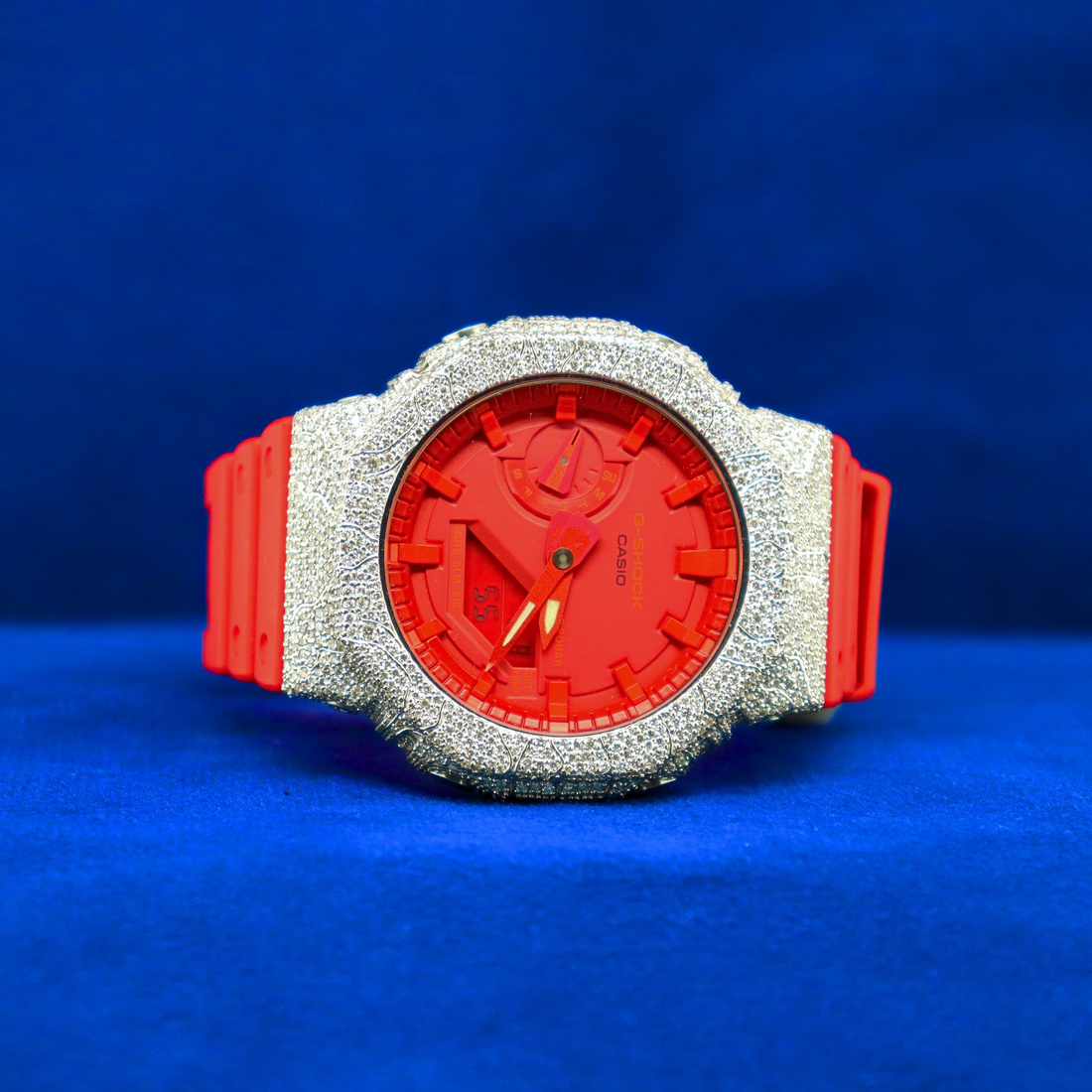 Front view of Red Iced Phantom customize – half iced out custom digital watch in bold red, flooded with moissanite diamonds and 14K white gold finish