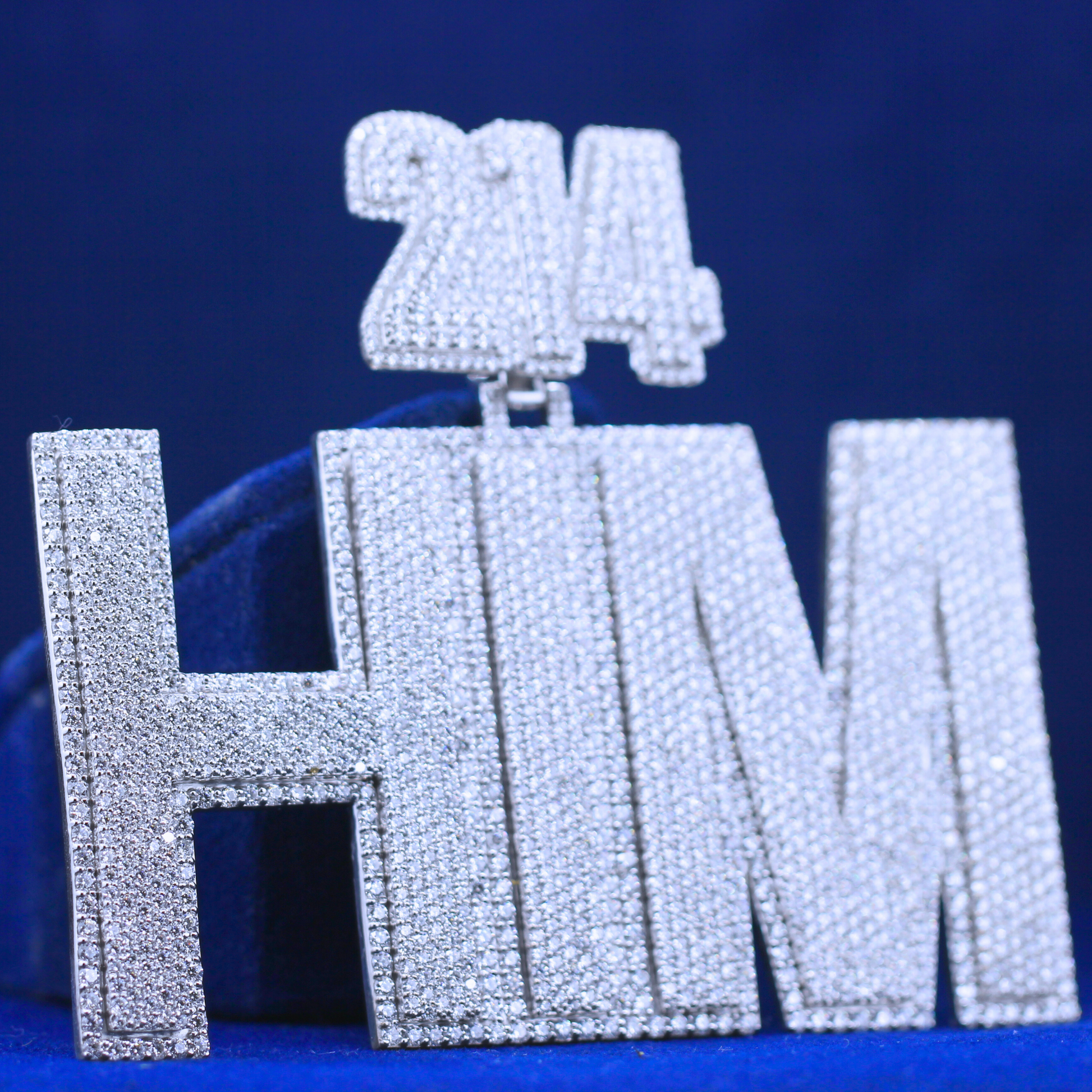 Right side angle of Iced 214 HIM Pendant – 14K white gold with moissanite diamond bling, perfect for iced out hip hop fashion