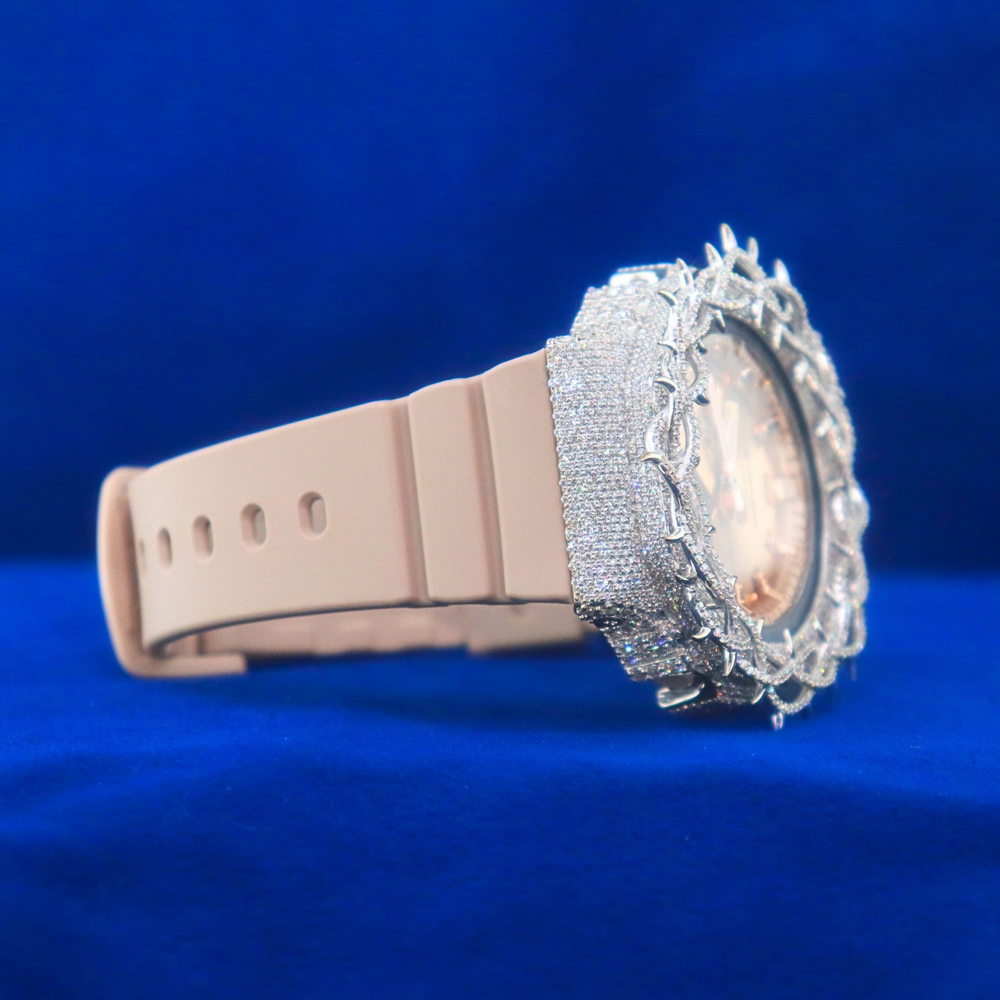 Right angle view of Rose Thorn Iced Phantom – half iced out custom rose gold and silver watch with moissanite diamonds and icy shine