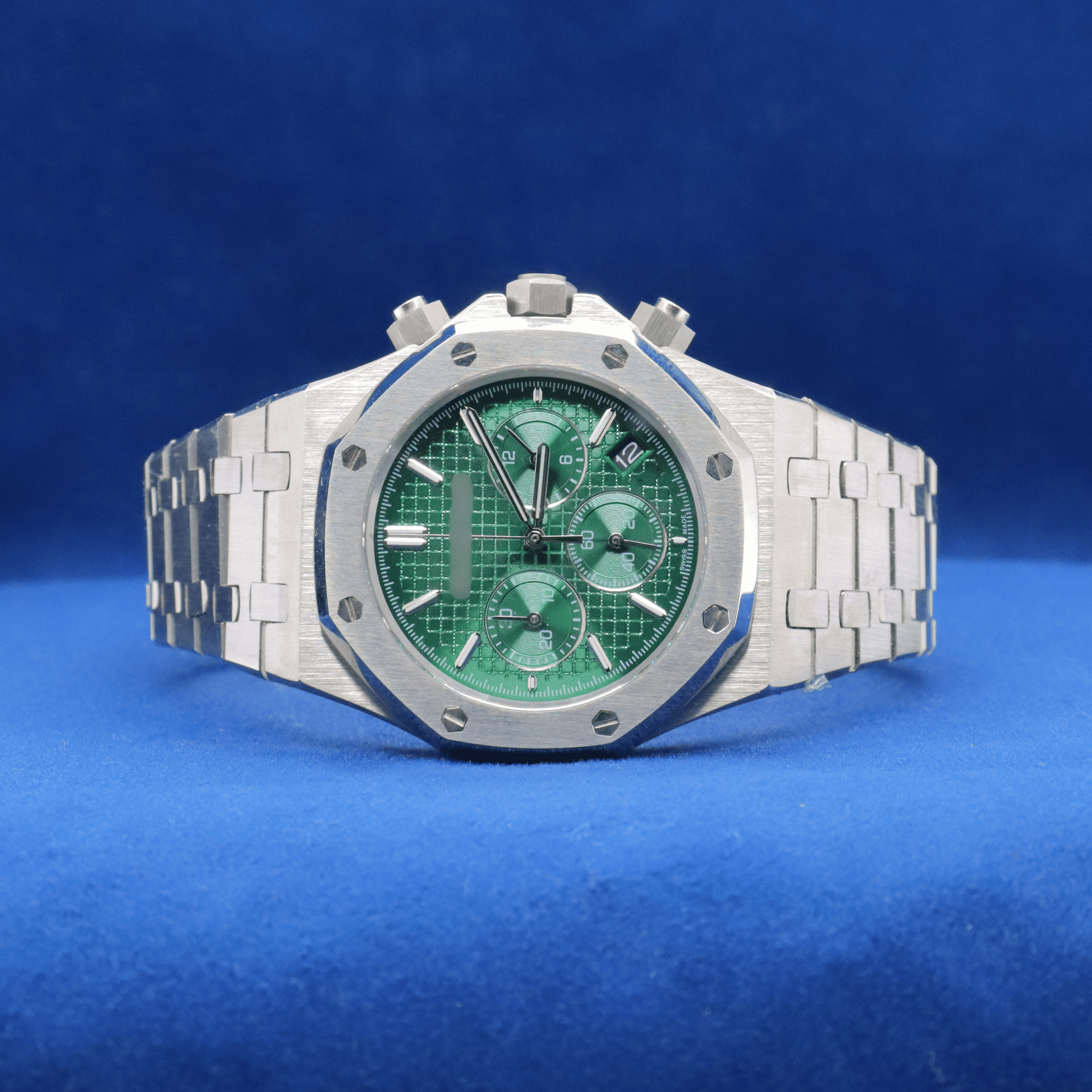 Front view of Royal Green Tapisserie Chrono plain stainless steel watch with a bold and modern design.
