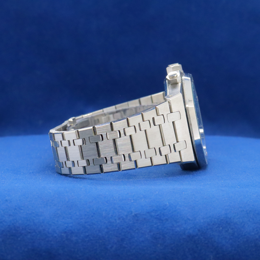 Right-side view of Royal Ice Blue Precision stainless steel watch, featuring a sleek and timeless look.