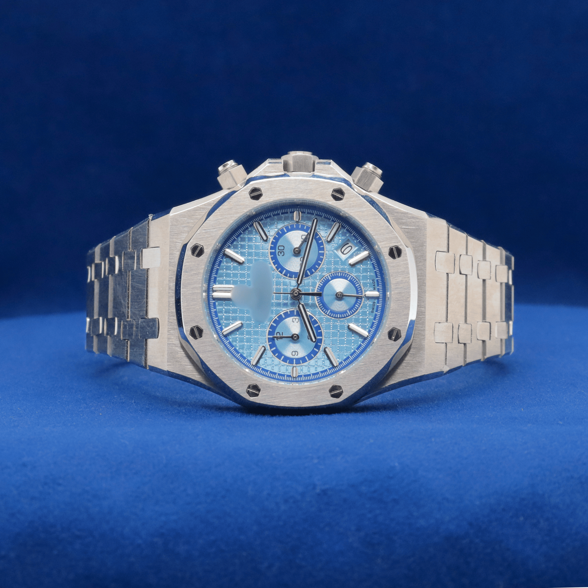Front view of Silver Steel Blue Chronograph plain stainless steel watch with a bold and modern design.