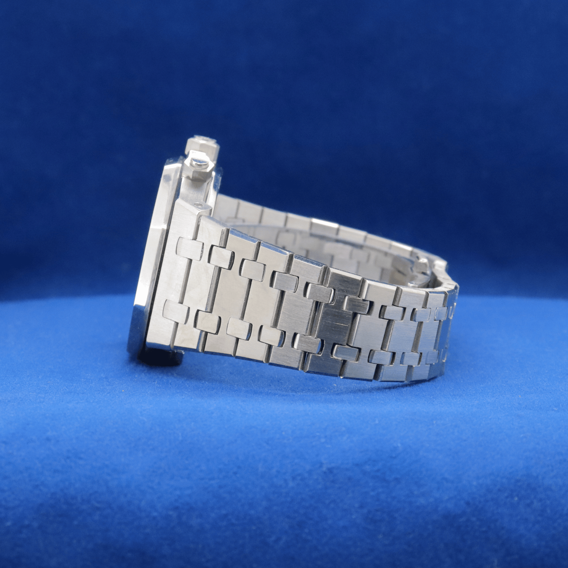 Left-side view of Silver Steel Blue Chronograph plain stainless steel watch, built for durability and style.