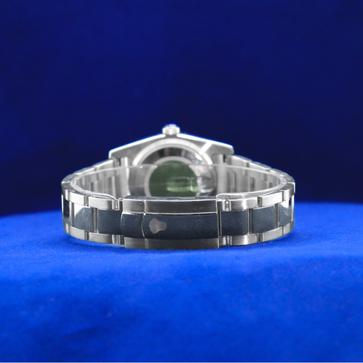 Back view of gunmetal grey dial half iced out custom watch showcasing stainless steel case back and premium build