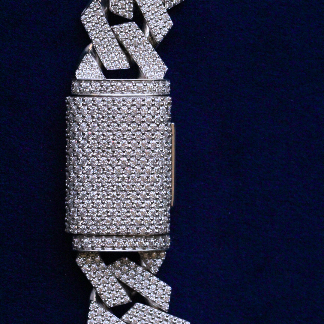 Zoomed-in view of the clasp lock on a Cuban Link Chain made with 925 silver and moissanite stones, showcasing secure fine jewelry craftsmanship.