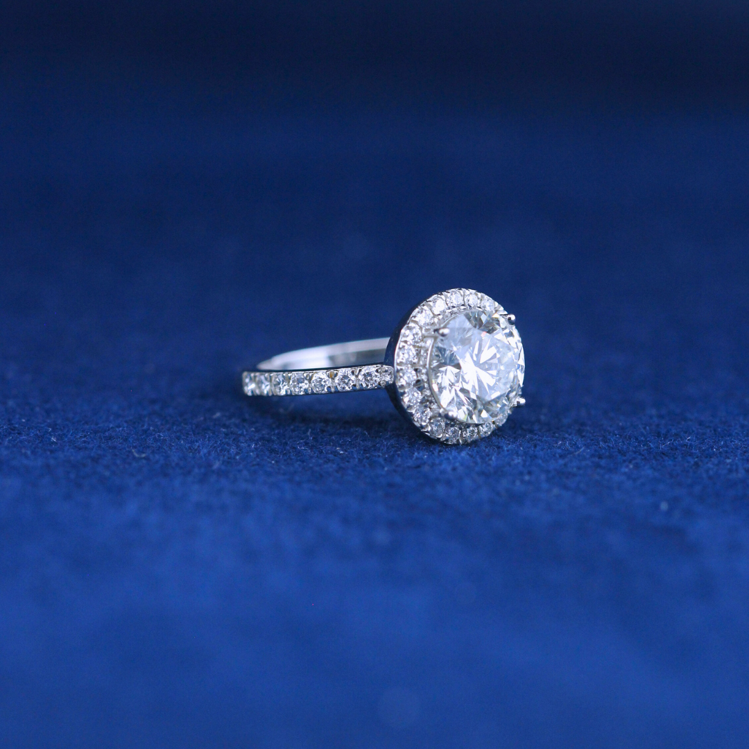 A left-side view of a fine jewelry solitaire diamond ring in 925 sterling silver, designed with a minimalist yet luxurious appeal.
