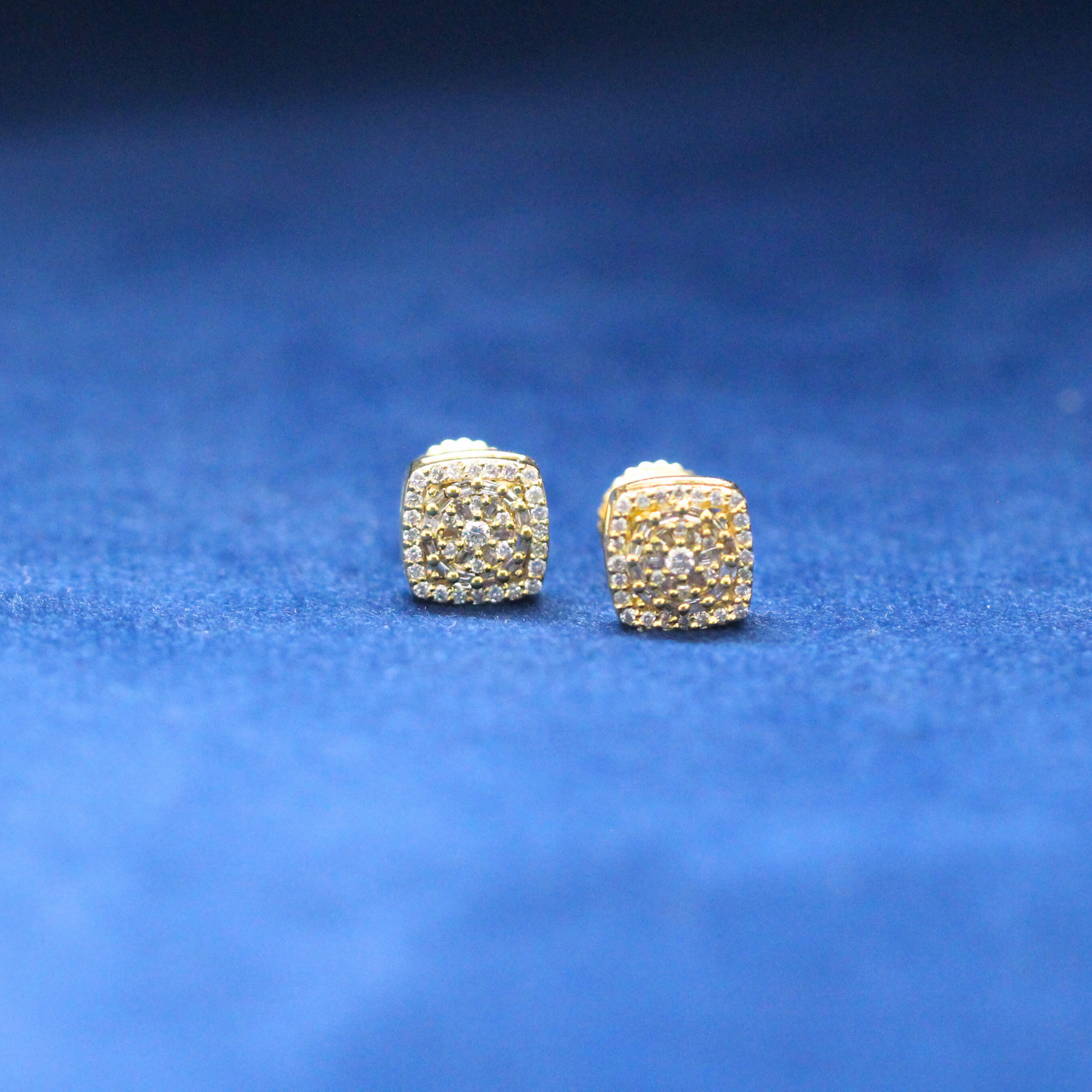 Golden Frost Studs earrings in 925 silver, iced out with Moissanite diamonds for a bold and stylish hip-hop jewelry statement.
