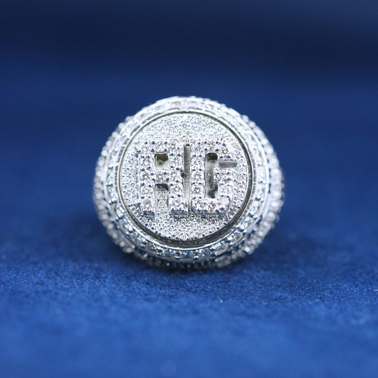A bold hip-hop jewelry RC Championship ring in 925 sterling silver, featuring intricate detailing and diamond accents for a statement look.
