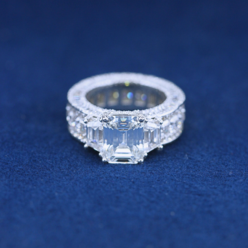 "A bold hip-hop jewelry total iced-out ring in 925 sterling silver, fully encrusted with dazzling diamonds for a statement-making look."