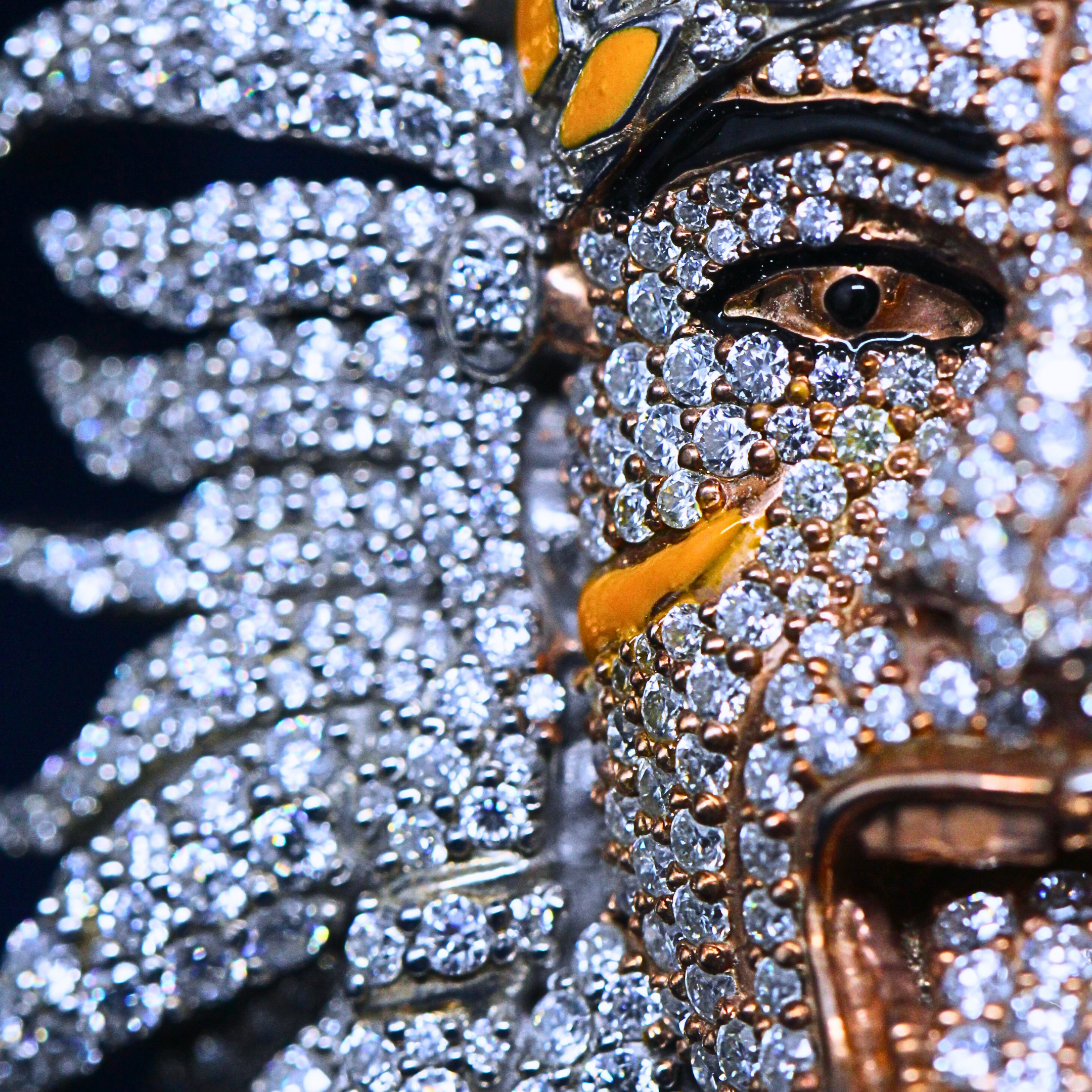 Close-up of the face detail on the Exclusive Pendant, highlighting moissanite brilliance and meticulous artistry in hip hop-inspired fine jewelry.


