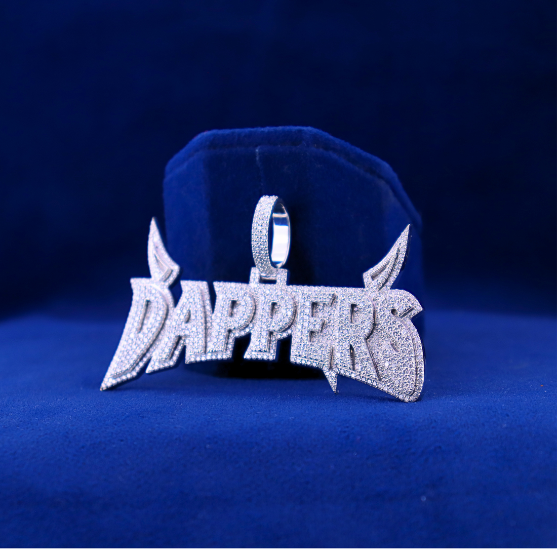 Front view of Dappers iced-out custom pendant in 14K silver with moissanite diamonds, matching half iced out custom watch
